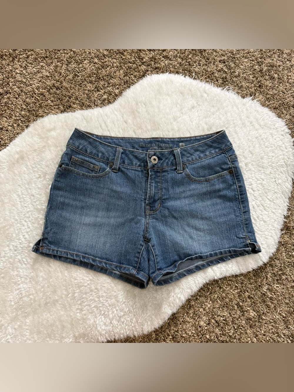 Girly grunge medium wash mid rise denim shorts